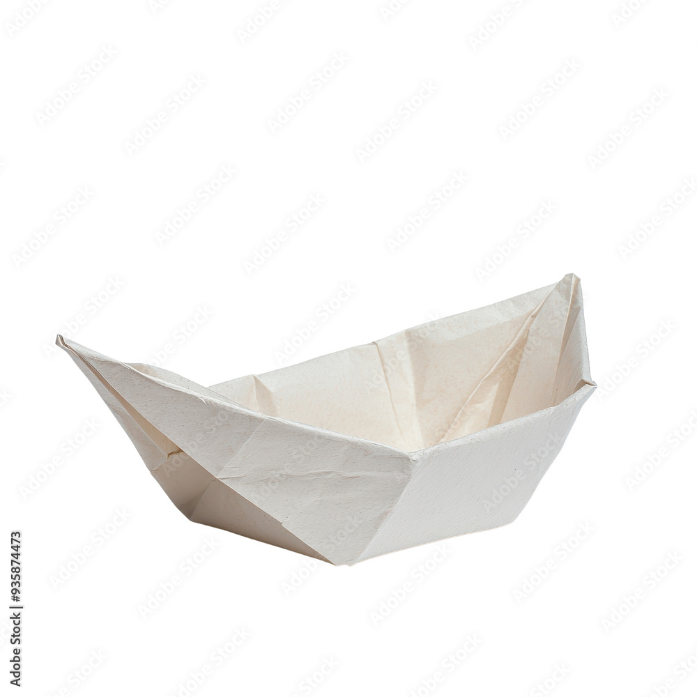 A crafted paper boat isolated on a white background. A crafted paper boat isolated on a white background.