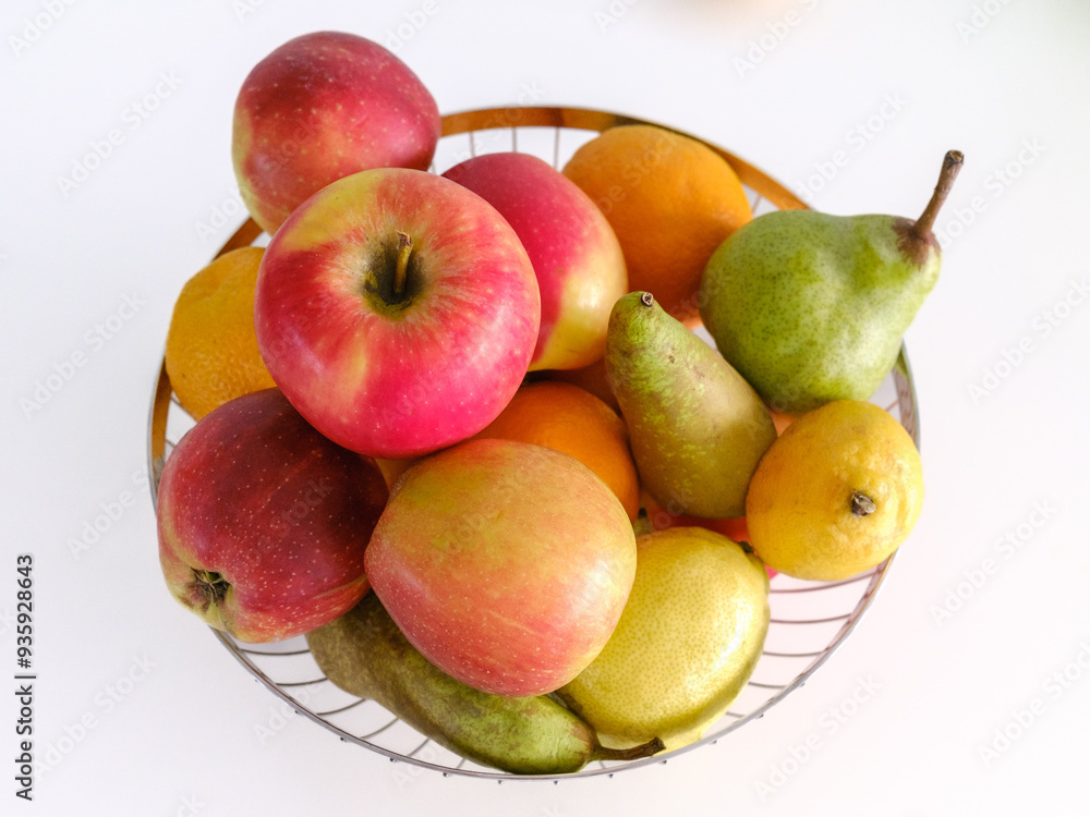 fruit basket with a variety of organic fruits on white background fruit basket with a variety of organic fruits on white background