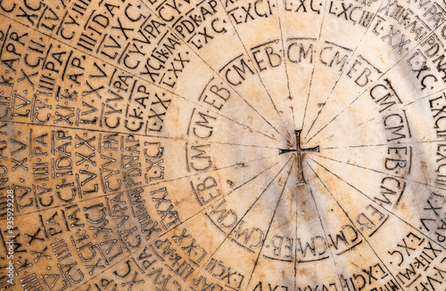 Ancient round calendar in latin