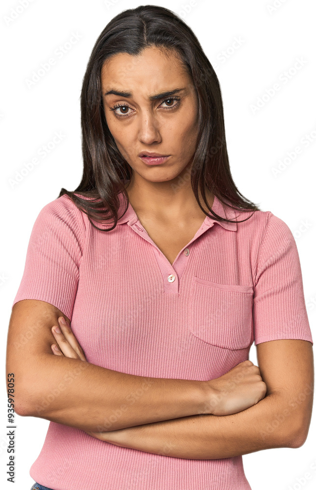 Fototapeta premium Hispanic young woman unhappy looking in camera with sarcastic expression.