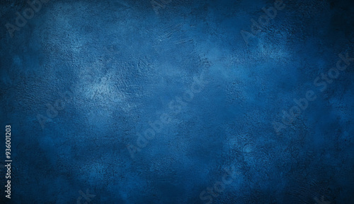 Deep blue textured background with a rough surface, perfect for adding a touch of depth and texture to your design projects.