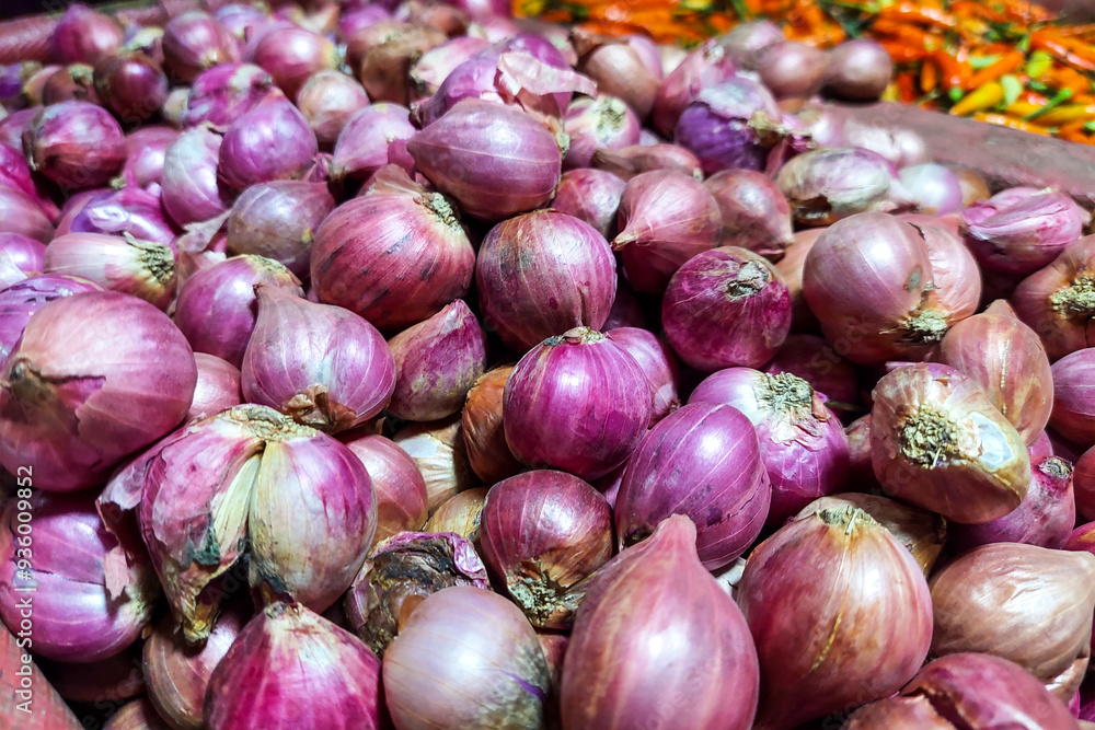Pile of Shallots for sale at market Pile of Shallots for sale at market
