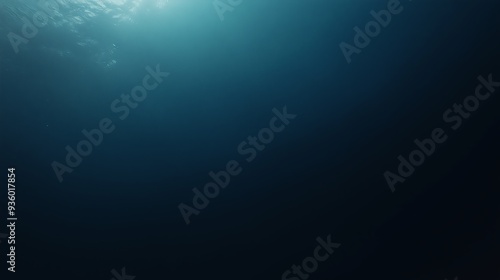 Underwater view with deep blue light, a mysterious and immersive background for aquatic themes

