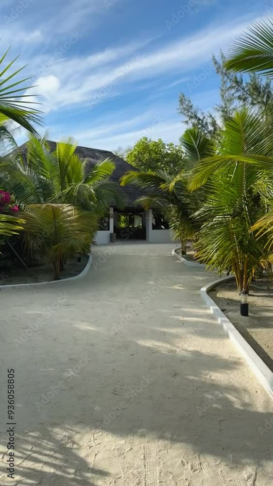 Walking through the houses in Maldives. Vacations. Beautiful sky Walking through the houses in Maldives. Vacations. Beautiful sky