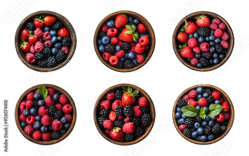 Fresh berries in a wooden bowl isolated on a transparent or white background, top view, cut out, PNG