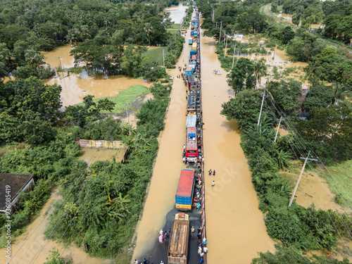 August 23, 2024, Feni, Chittagong, Bangladesh: Aerial view of Flooded Dhaka-Chittagong Highway and villages in Muhuriganj area of ​​Feni district of Chittagong division of Bangladesh.  photo