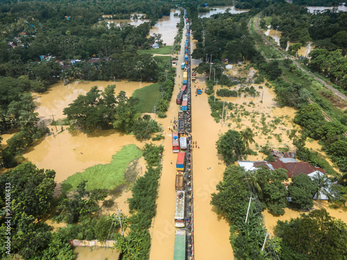 August 23, 2024, Feni, Chittagong, Bangladesh: Aerial view of Flooded Dhaka-Chittagong Highway and villages in Muhuriganj area of ​​Feni district of Chittagong division of Bangladesh.  photo