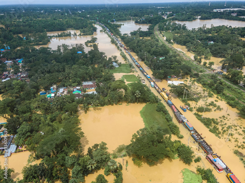 August 23, 2024, Feni, Chittagong, Bangladesh: Aerial view of Flooded Dhaka-Chittagong Highway and villages in Muhuriganj area of ​​Feni district of Chittagong division of Bangladesh.  photo