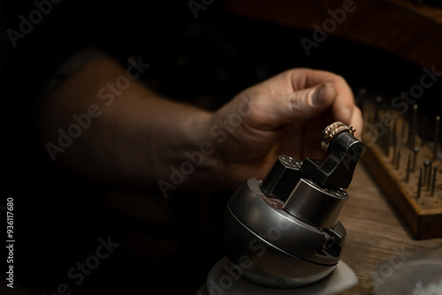 The work of jewelers. Trial jewelry of semiprecious metals. Ring. Selective focus. Macro photo.