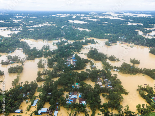 August 23, 2024, Feni, Chittagong, Bangladesh: Aerial view of Flooded Dhaka-Chittagong Highway and villages in Muhuriganj area of ​​Feni district of Chittagong division of Bangladesh.  photo