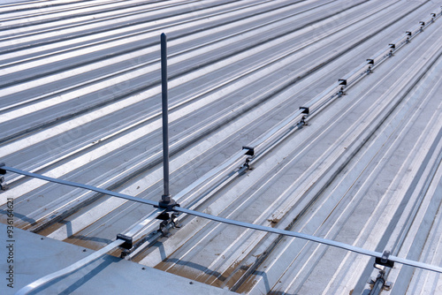 Lightning Protection Pole,lightning protection system to prevent lightning damaging the building is install on metal sheet rooftop building.