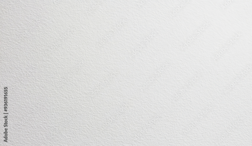 White textured paper background with a subtle rough surface. White textured paper background with a subtle rough surface.