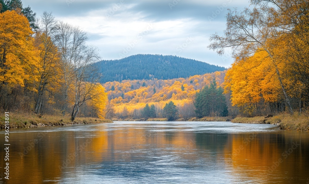 Fototapeta premium Scenic autumn landscape with forested hills and river