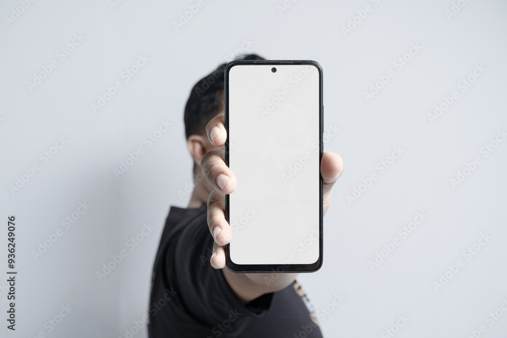 Person Holding Smartphone with Blank Screen Person Holding Smartphone with Blank Screen