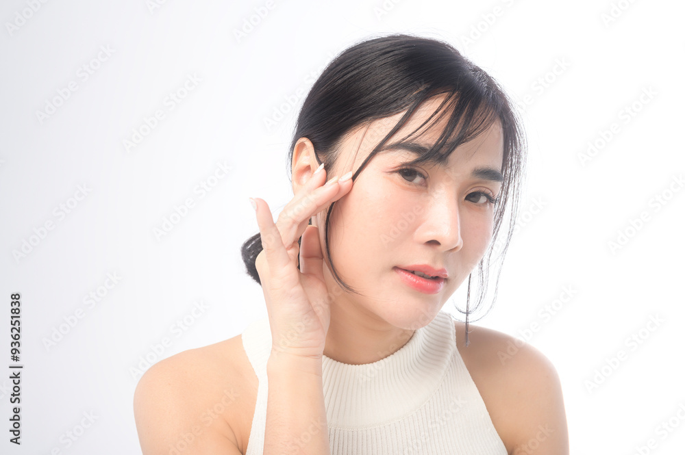 A portrait of young beautiful woman face with smooth healthy skin on white background , Skincare concept. A portrait of young beautiful woman face with smooth healthy skin on white background , Skincare concept.