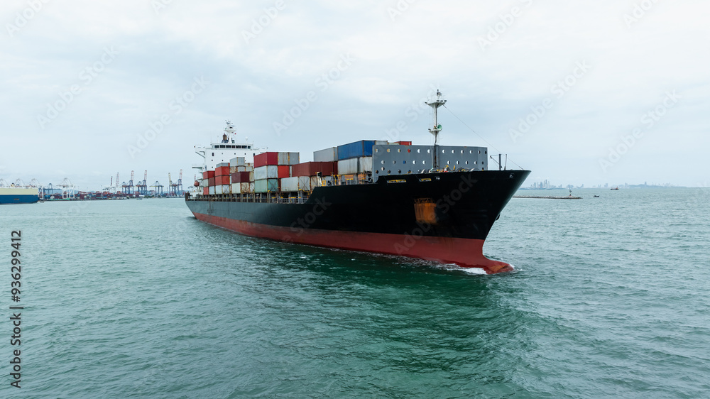 logistic cargo container ship sailing in sea to import export goods and distributing products to dealer and consumers across worldwide, by container ship Transport business logistic cargo container ship sailing in sea to import export goods and distributing products to dealer and consumers across worldwide, by container ship Transport business