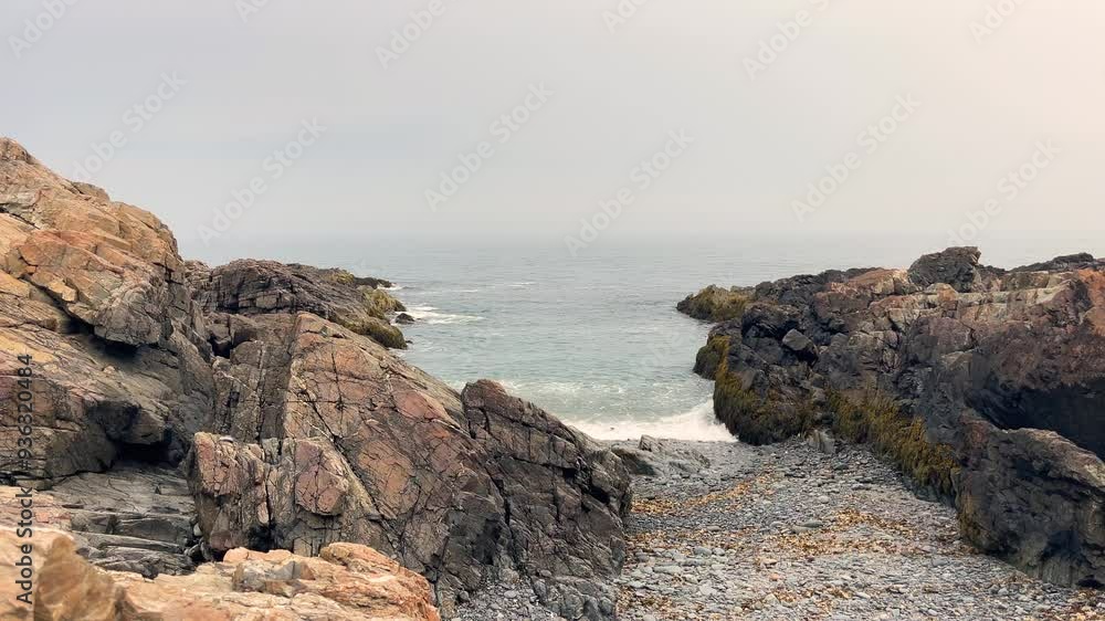 Established of ocean beach with rocks during warm afternoon light in Ogunquit, Maine famous travelling destination in USA Established of ocean beach with rocks during warm afternoon light in Ogunquit, Maine famous travelling destination in USA