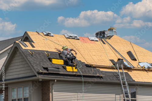 A roofer installs a special pipe for ventilation outlet