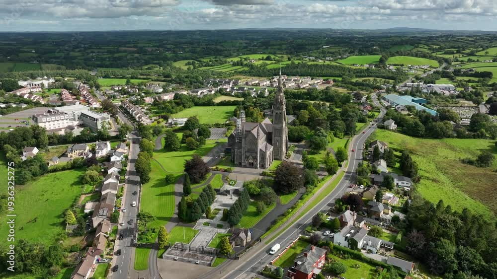 St. Macartan's Cathedral, County Monaghan, Ireland, September 2022. Drone orbits clockwise while descending towards the scaffolding clad Gothic Revival architecture as the chuch is carefully restored. St. Macartan's Cathedral, County Monaghan, Ireland, September 2022. Drone orbits clockwise while descending towards the scaffolding clad Gothic Revival architecture as the chuch is carefully restored.