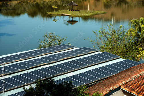 Solar Energy: photovoltaic panel modules on the roof of homes as a model for generating energy photo