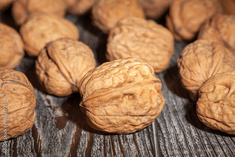 walnuts group on wood background walnuts group on wood background
