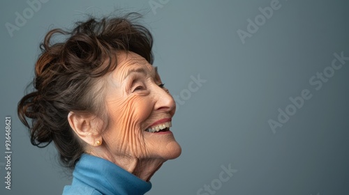 The elderly smiling woman