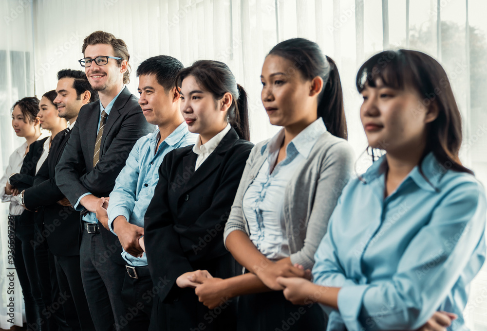 Obraz premium Modern diversity and multicultural company, business people joining hand together and standing in line, shared commitment to collaboration and cooperation concept background. Meticulous