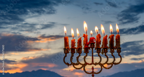 Glitter lights of candles is traditional symbols for Jewish Hanukkah Holiday ...