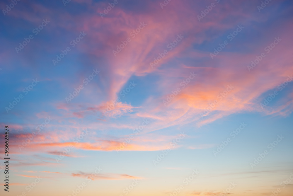 Fototapeta premium evening sky with blue, white and red clouds