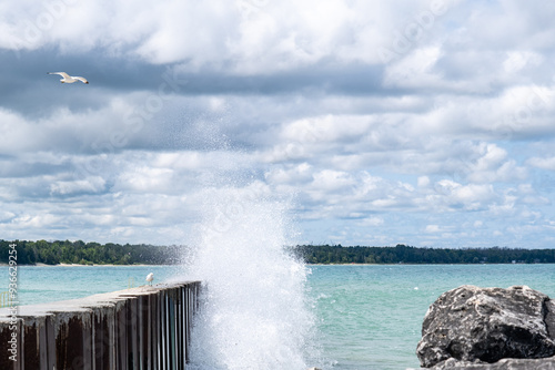 Bild auf Leinwand Waves crashing on the Port Elgin breakwall