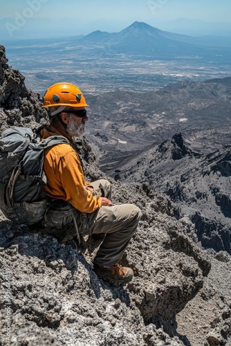 Hiker gazes at a majestic volcano from a rocky peak on a sunny day