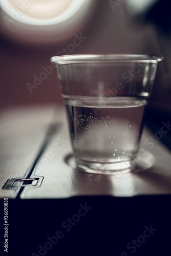 On flight, a glass of water