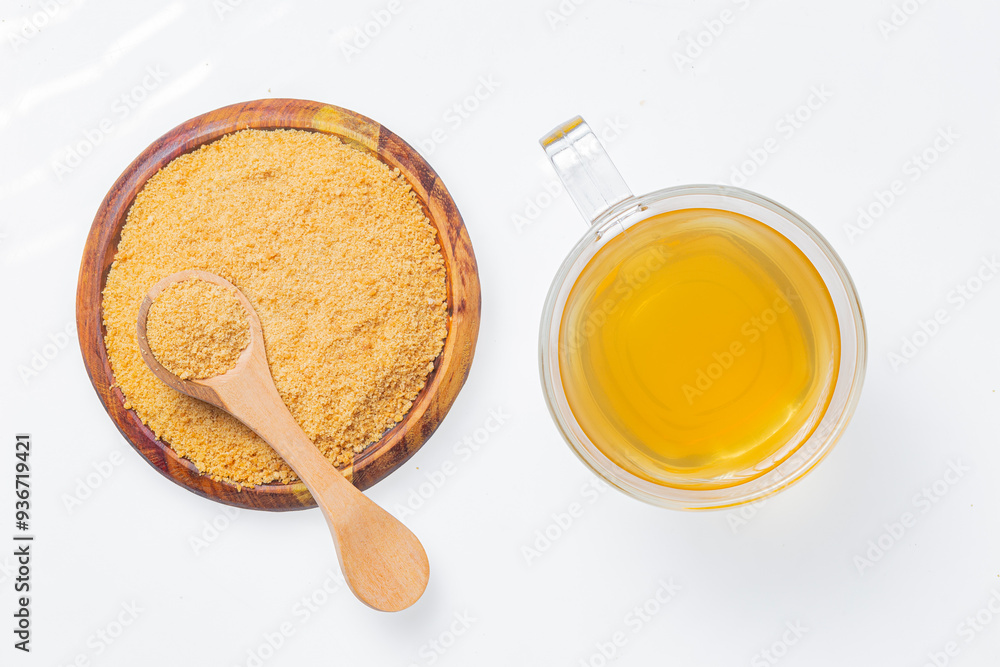 Drink of piloncillo and ground piloncillo, on white background Drink of piloncillo and ground piloncillo, on white background