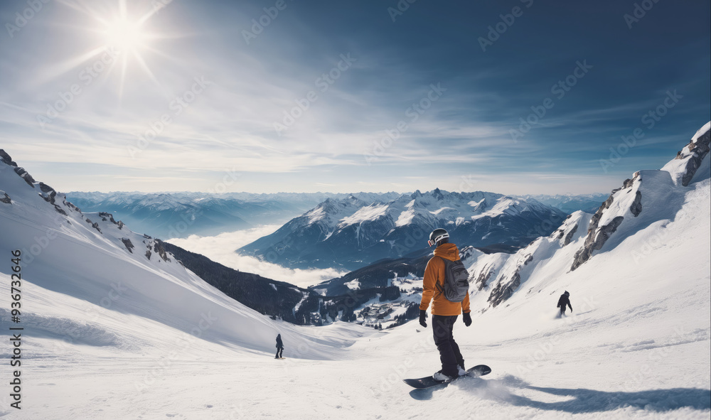 A snowboarder glides down a snowy mountain slope on a sunny day A snowboarder glides down a snowy mountain slope on a sunny day