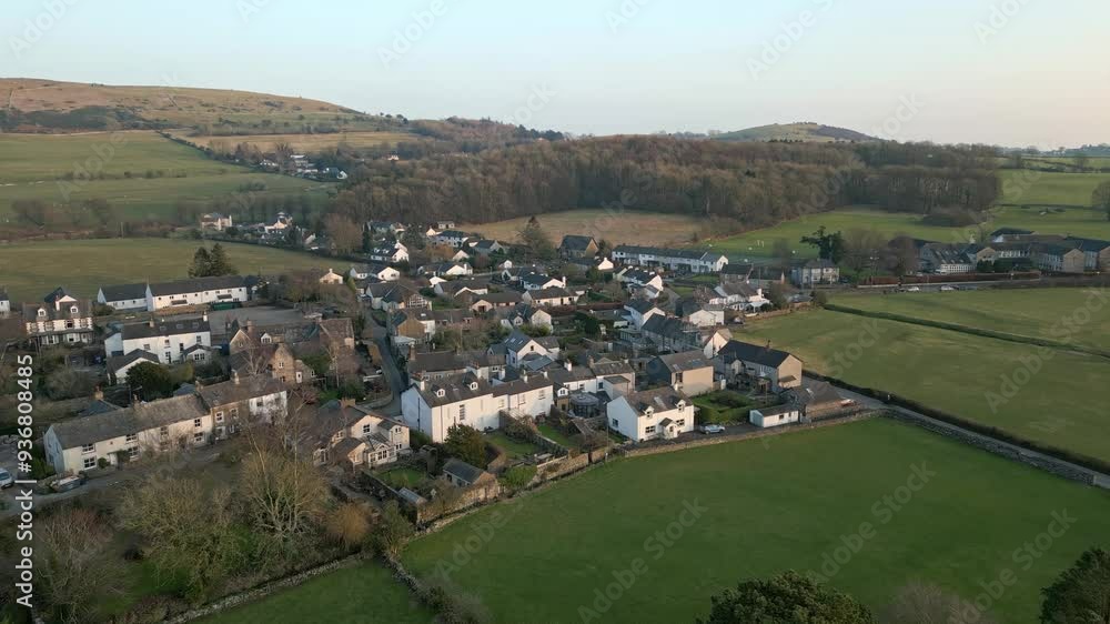 Slow Motion clip of the Cumbrian medieval village of Cartmel showing the historic Cartmel Priory at sunset Slow Motion clip of the Cumbrian medieval village of Cartmel showing the historic Cartmel Priory at sunset