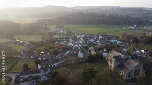 Cinematic aerial drone footage of Cartmel Village at sunset. Cumbria UK. photo