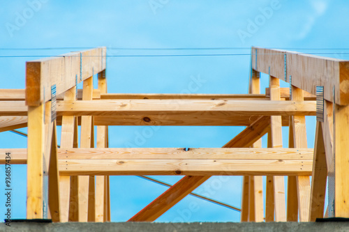 Wooden Framework Construction Under a Bright Blue Sky - Architectural Design Focused On Building Structure and Support Framework