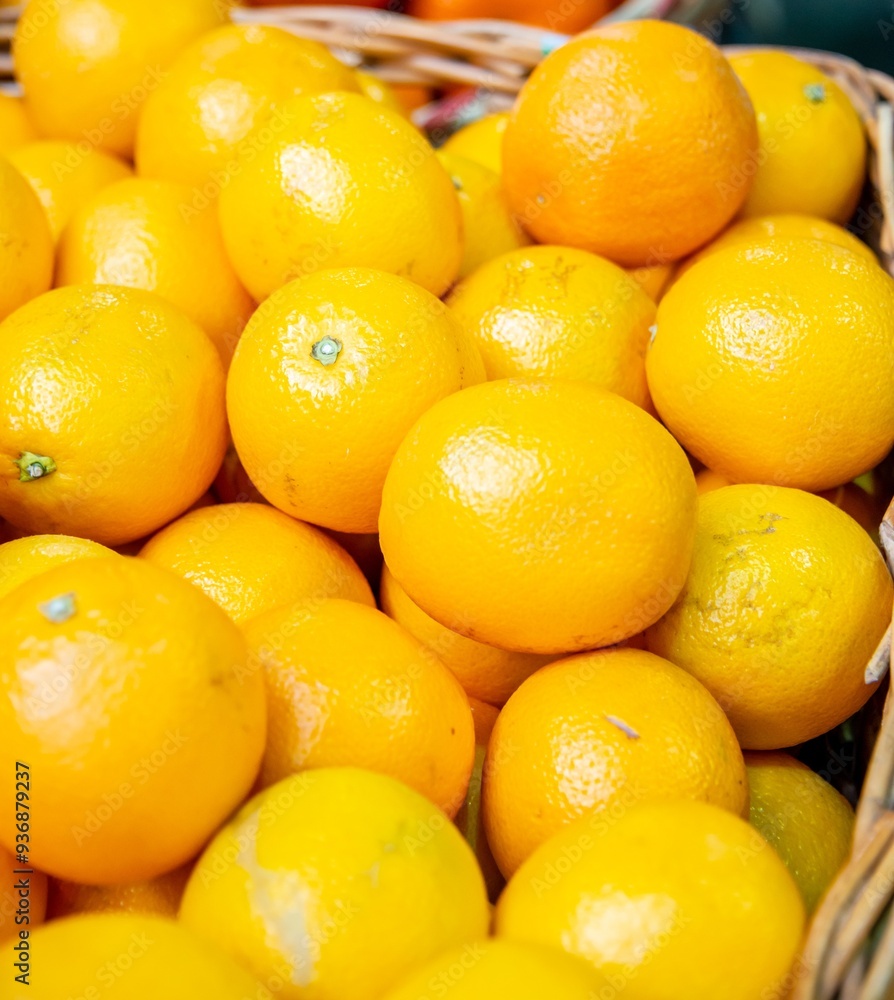 Citrus fruits at the market display stall Citrus fruits at the market display stall