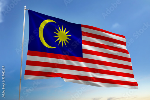 Malaysia's national flag waving in the blue sky. flag for Independence Day.