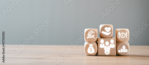 Konstfotografi Wooden blocks with icons symbolizing various employee benefits such as health, financial perks, and wellness programs, illustrating modern workplace incentives