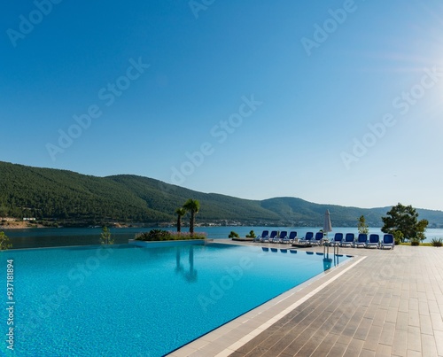 Nice swimming pool outdoors on bright summer day