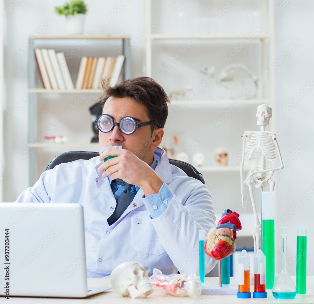 Funny doctor having fun in hospital lab Funny doctor having fun in hospital lab