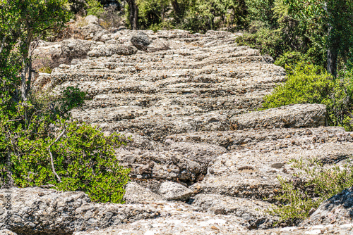 The scenic views of the ancient roman road of Selge, which was an important city in ancient Pisidia and later in Pamphylia, on the slope of Mount Taurus, Antalya, Turkey photo