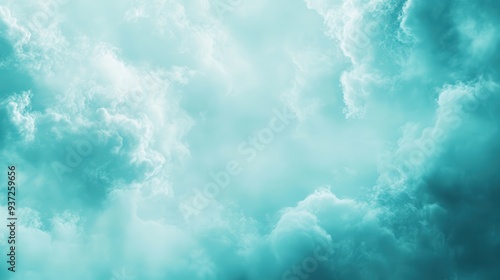 A serene sky filled with soft, billowy clouds in a soothing turquoise hue.