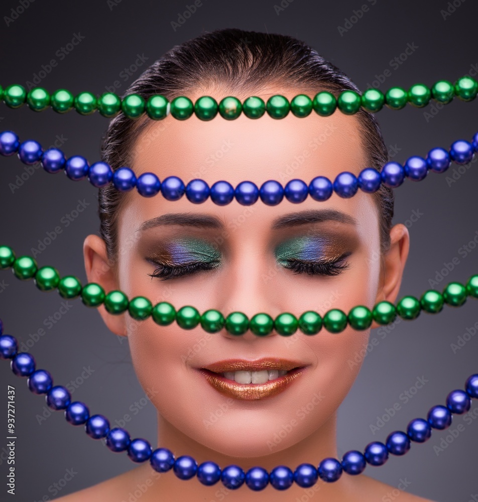 Beautiful woman with jewellery in beauty concept