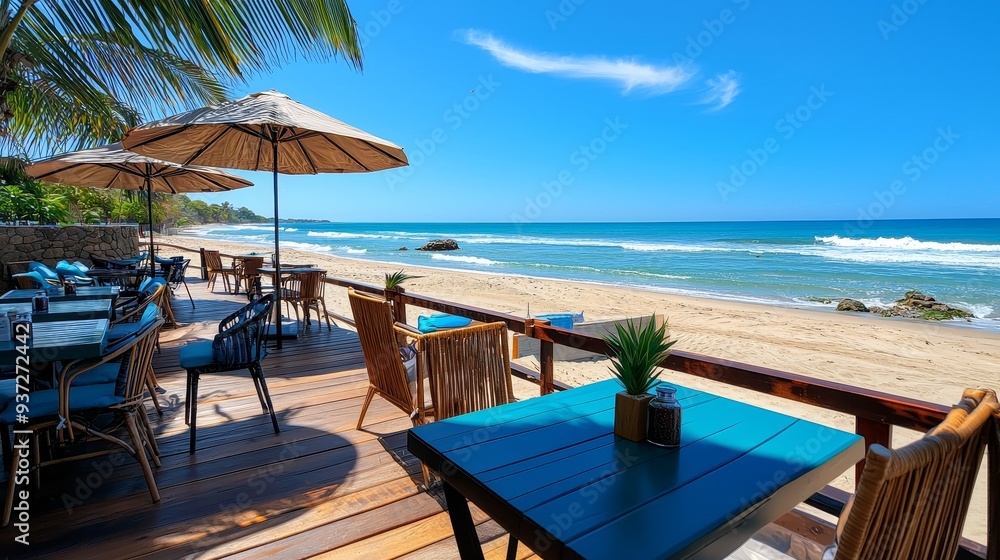 Beachfront cafe with views of the waves, offering smoothies and snacks.