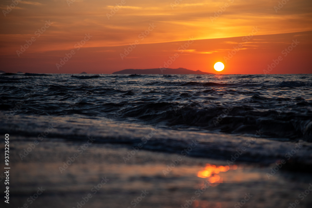 Beautiful scenic sunset over mediterranean sea, seen from the Valledoria beach, Sardinia, Italy. Beautiful scenic sunset over mediterranean sea, seen from the Valledoria beach, Sardinia, Italy.