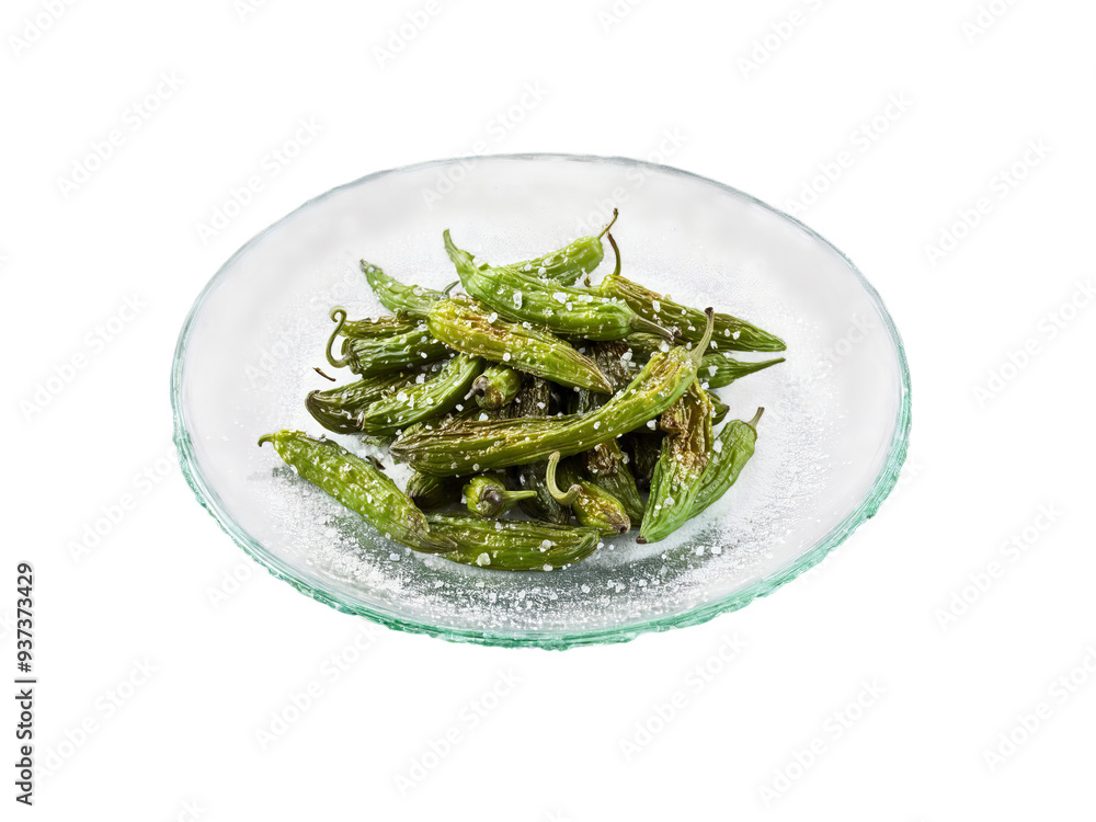 Tapas fried padron peppers sprinkled with sea salt served on a transparent glass plate mildly Tapas fried padron peppers sprinkled with sea salt served on a transparent glass plate mildly
