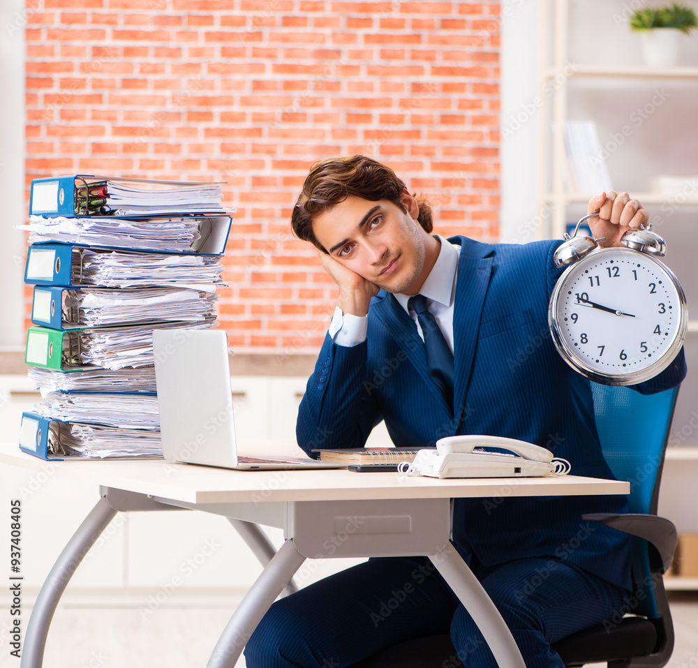 © Elnur - Young elegant man unhappy with too much work © Elnur - Young elegant man unhappy with too much work