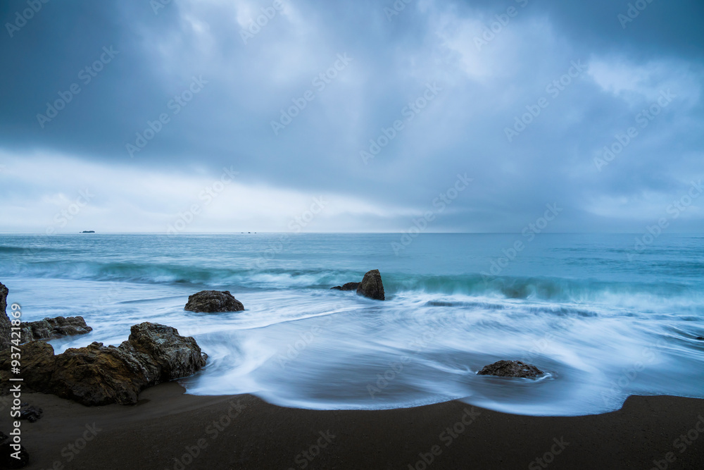 Sea stacks at the beach and dramatic sky, Aichi Prefecture, Japan Sea stacks at the beach and dramatic sky, Aichi Prefecture, Japan